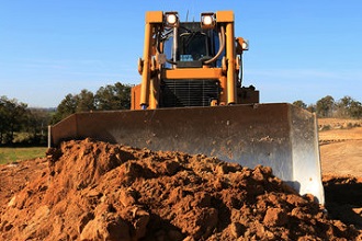 Подъем участка. Поднятие уровня земли с помощью планировочного или плодородного грунта.